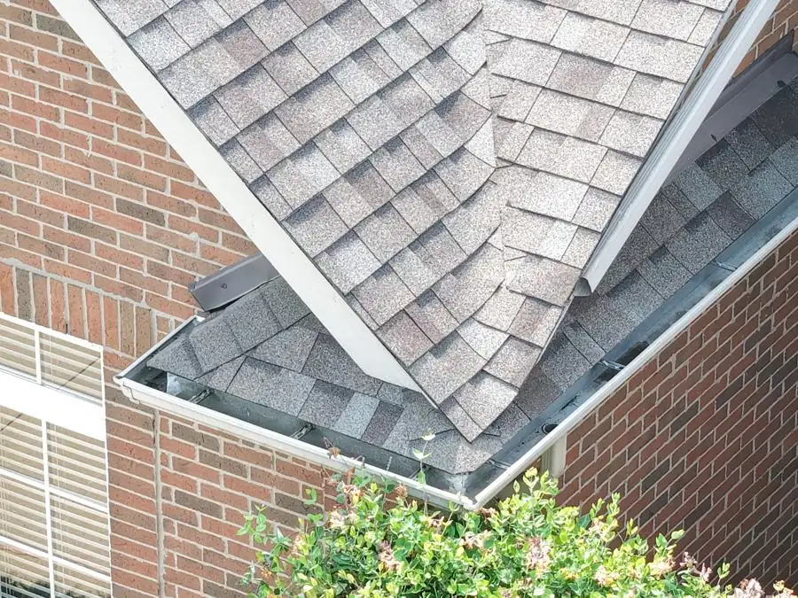 Drone photo of a roof valley and gutter transition